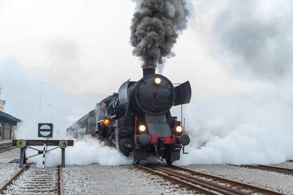 steaming railroad train