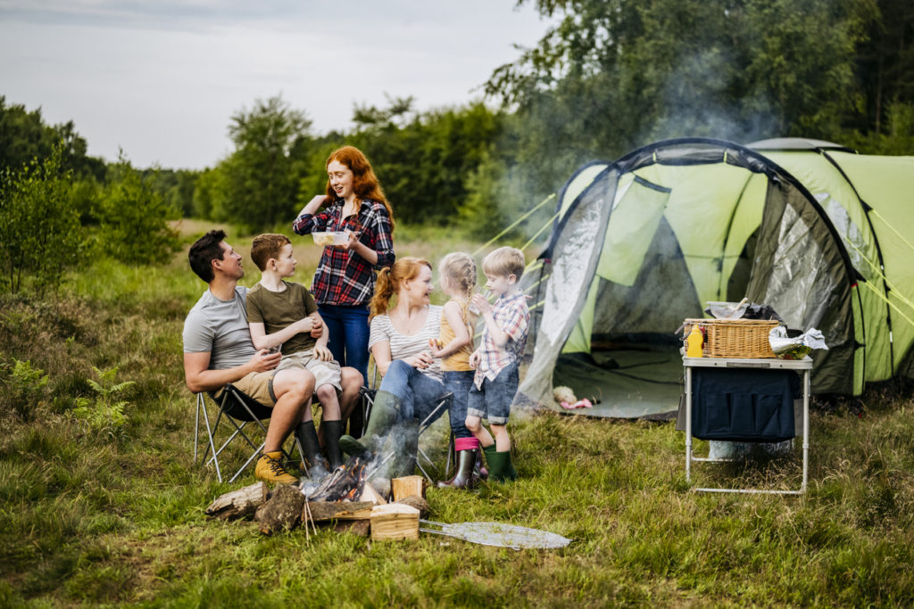 Family enjoying camping trip together